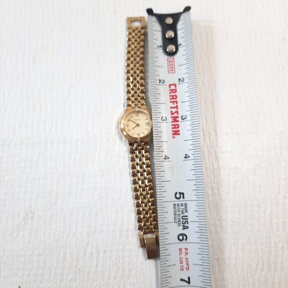 Vintage Bulova Women Watch Gold Stainless Steel‎ Water Resist Battery Date round main image 10